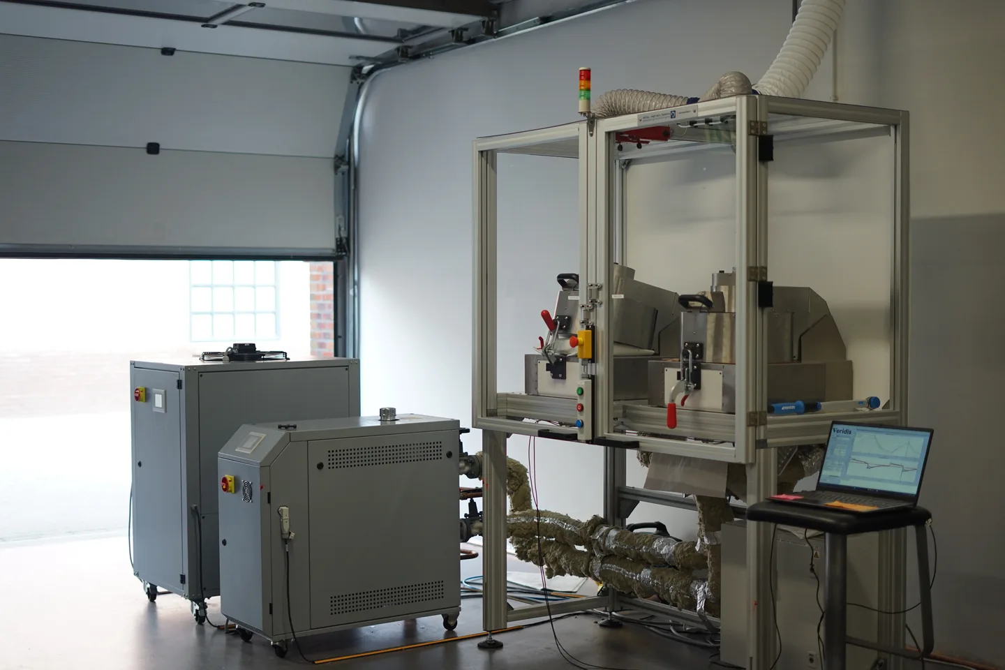 MADSCAN system with its enclosure, supporting equipment and measurement laptop.